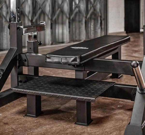 Posilovací lavice bench press PRIMAL STRENGTH Pro Series Olympic Bench platforma pro dopomoc